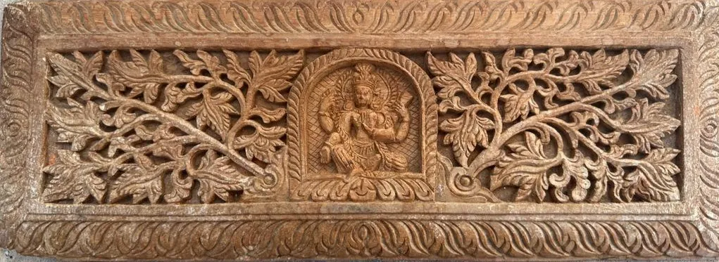 Goddess Parā carved on a 400-year-old wooden book cover